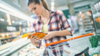 woman looking at packaging