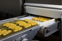 Coles frozen bread entering oven